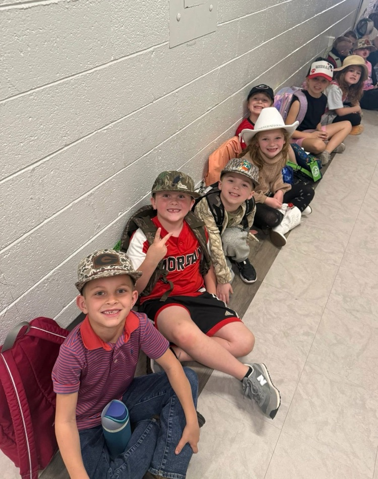 students wearing hats to celebrate reading nonfiction books