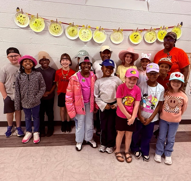 students wearing hats to celebrate reading nonfiction books