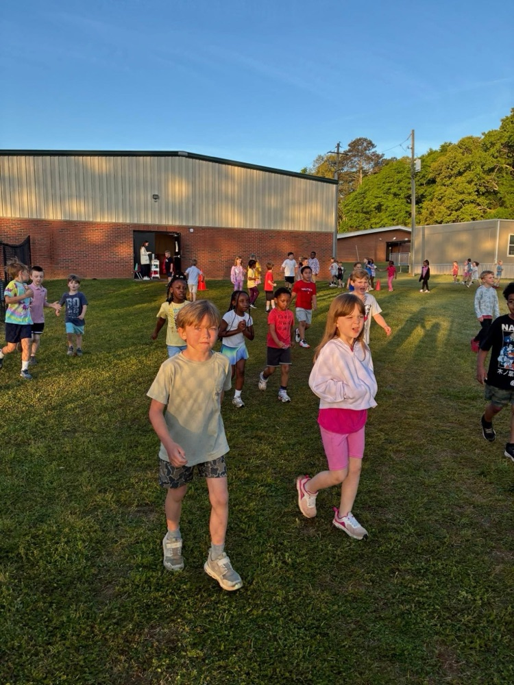 students enjoy walking and running to Track Club at MCPS!