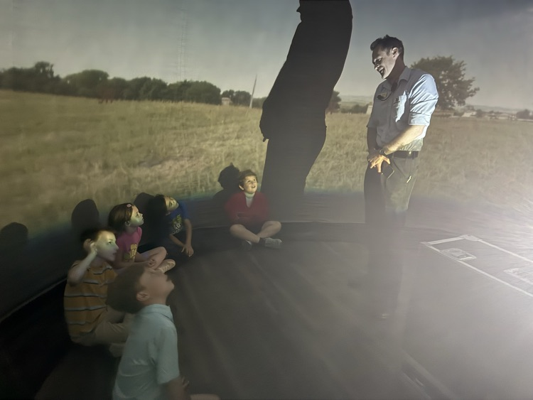 students in the Star Lab viewing the sky with Mr. Dodd.