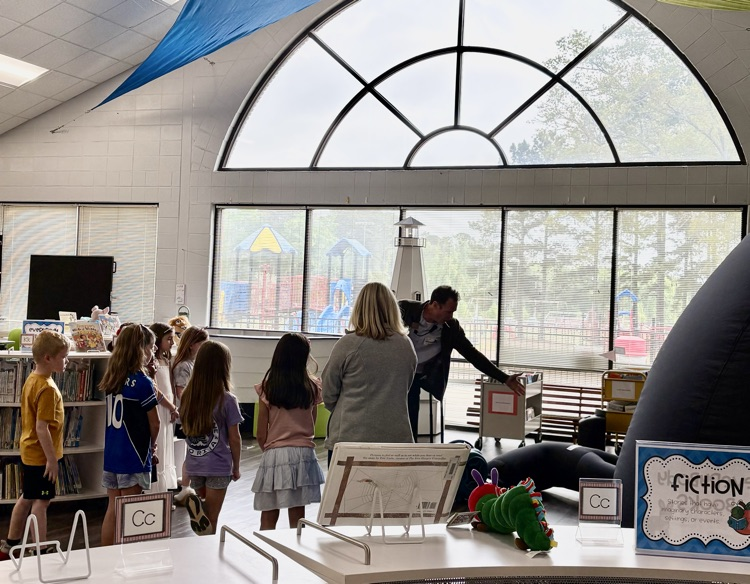 students in the Star Lab viewing the sky with Mr. Dodd.