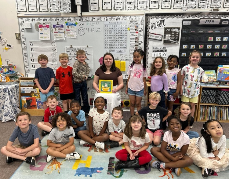 FERST volunteers read the book Bunny Cakes to students. 