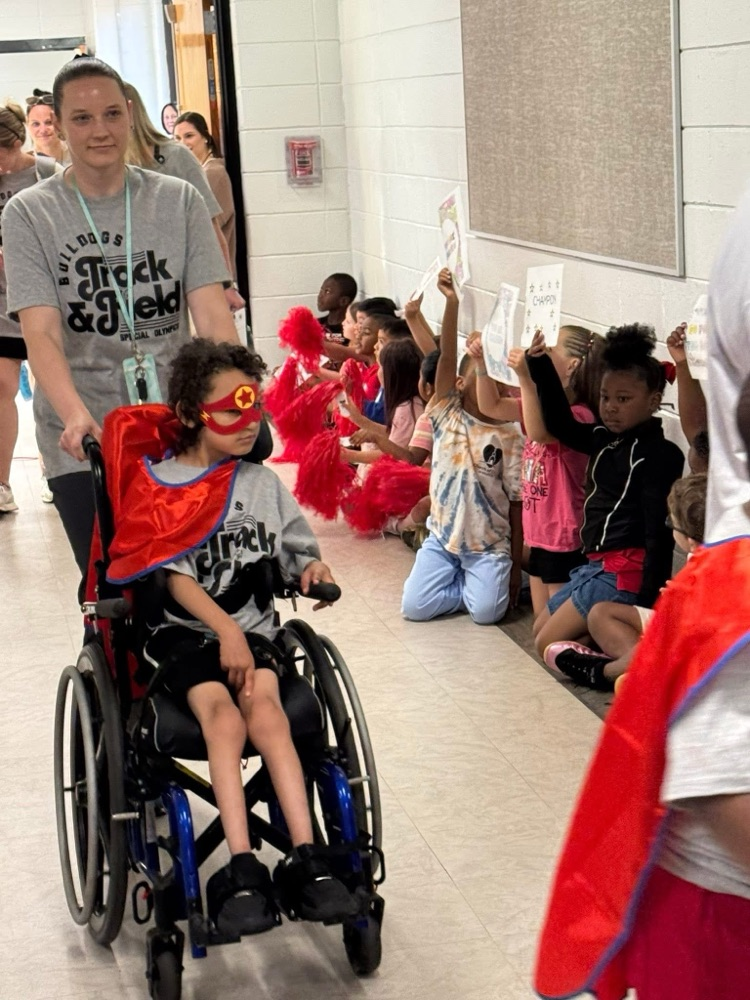 Students and staff cheered for our awesome students on their way to Special Olympics.
