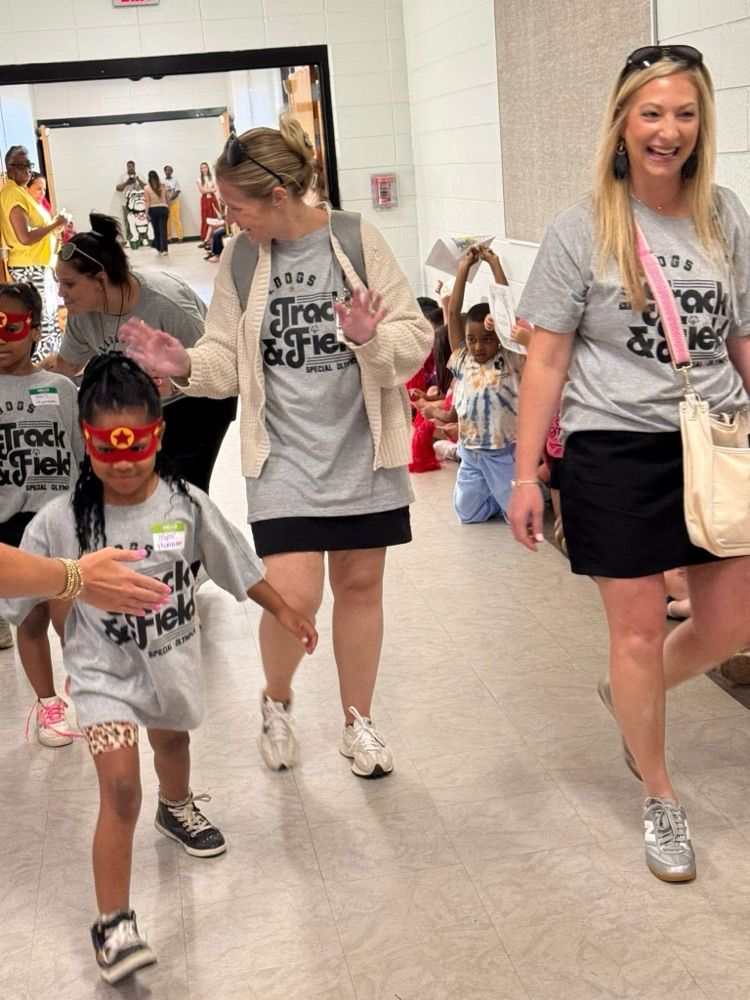 Students and staff cheered for our awesome students on their way to Special Olympics.