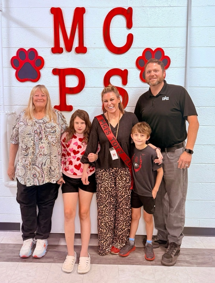teacher of the year, Mrs. Kayla Sapp, with her family.