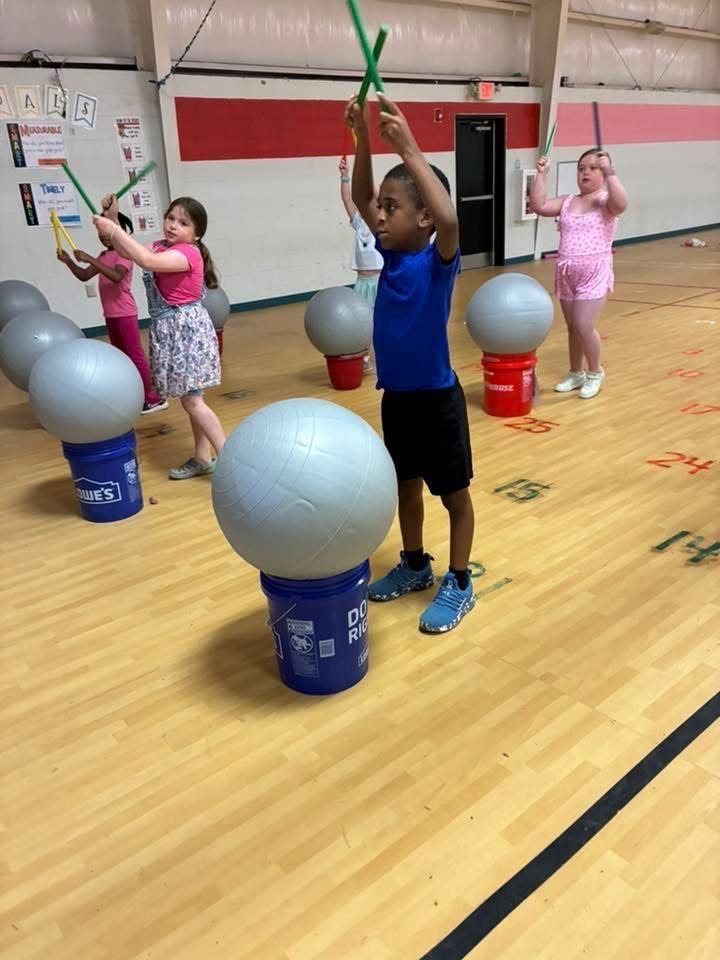 Students enjoyed cardio drumming in PE.