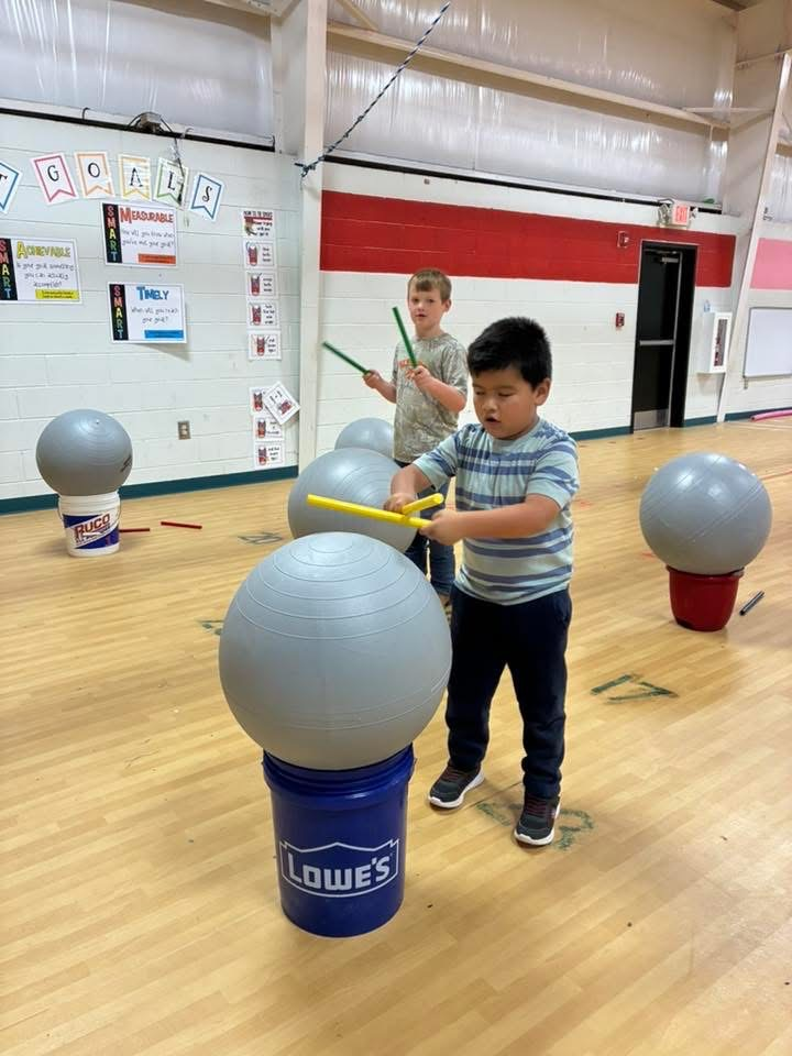 Students enjoyed cardio drumming in PE.