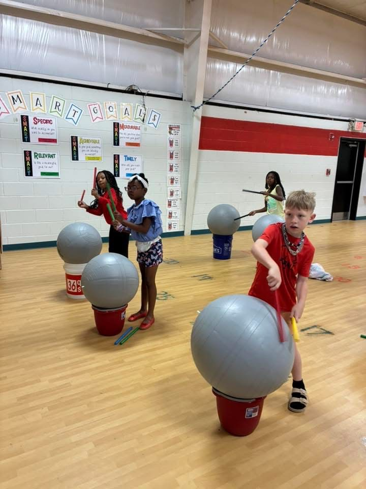 Students enjoyed cardio drumming in PE.