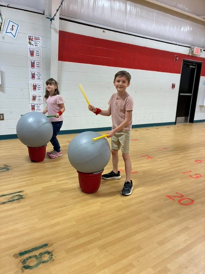 Students enjoyed cardio drumming in PE.