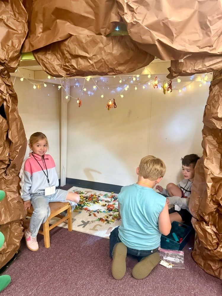 Kindergarten students practiced counting money during Tiny Town.
