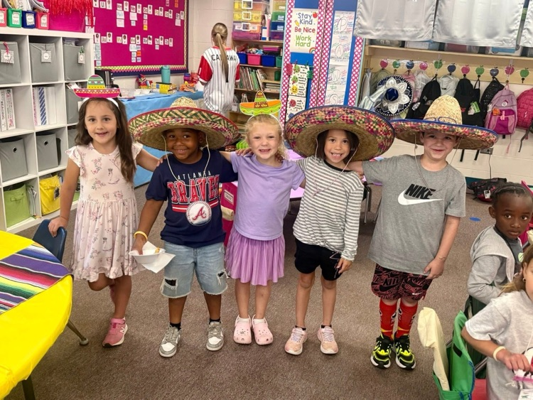 Kindergarten students practiced counting money during Tiny Town.