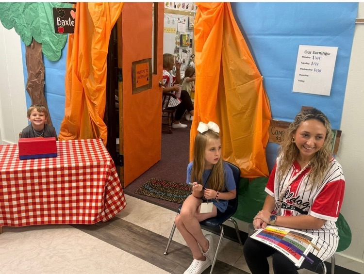 Kindergarten students practiced counting money during Tiny Town.