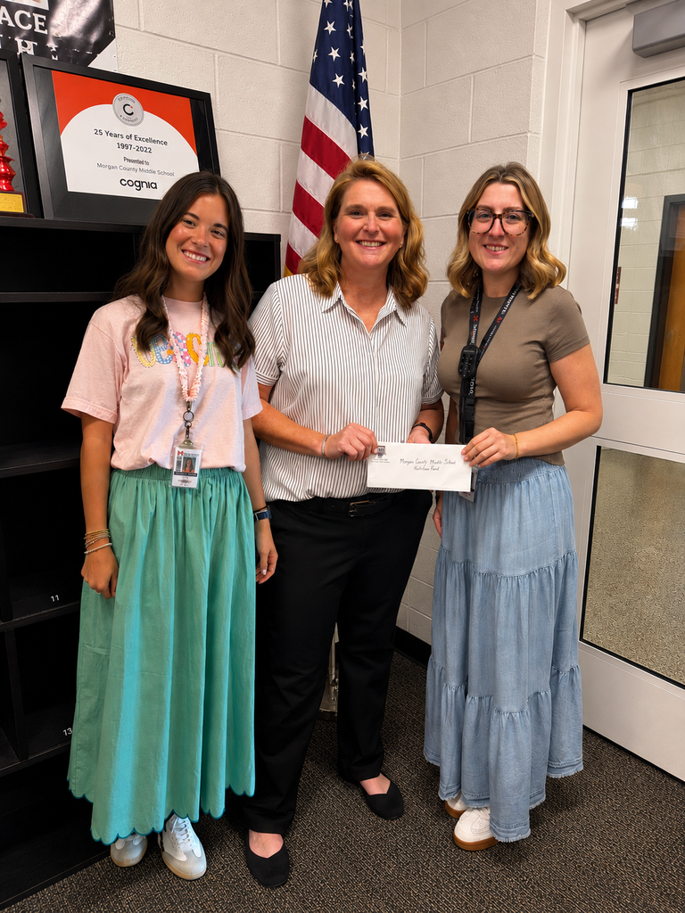 Ms. Jennifer Butler, CEO of the MCHS College and Career Academy, recently presented checks to Mishayla Brown and Riley Kable to support their classroom needs as first-year teachers.