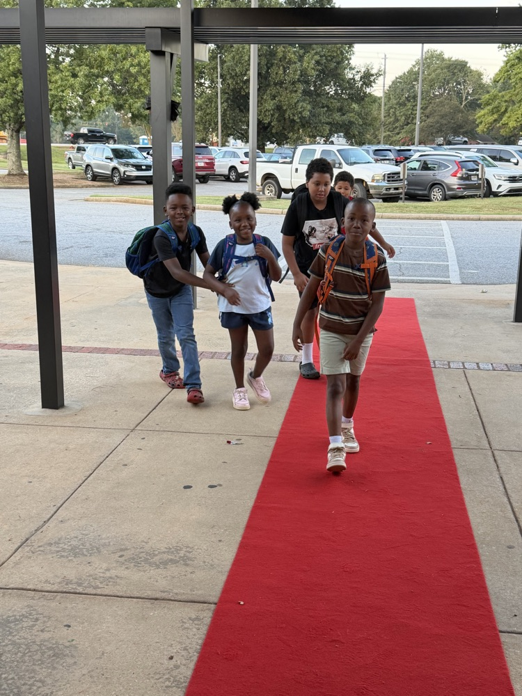 🌟 MCES Friday! 🌟 Our bulldogs hit the red carpet in style!