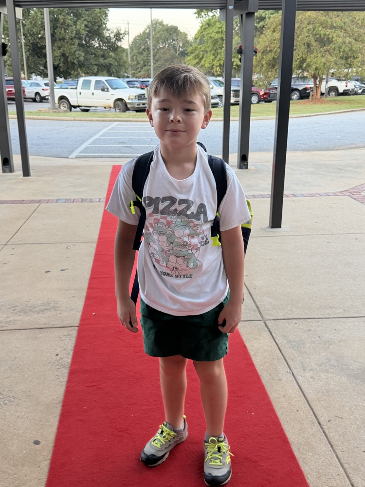 🌟 MCES Friday! 🌟 Our bulldogs hit the red carpet in style!
