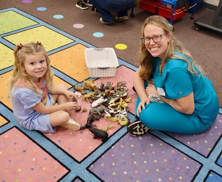 pre-k parents came to play in centers with their child.