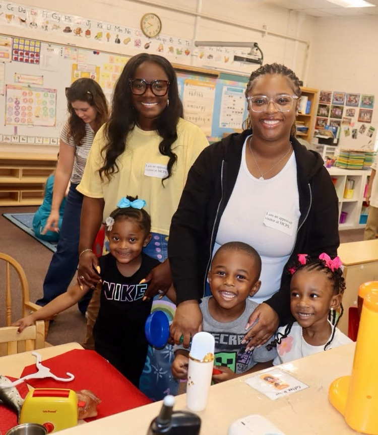 pre-k parents came to play in centers with their child.