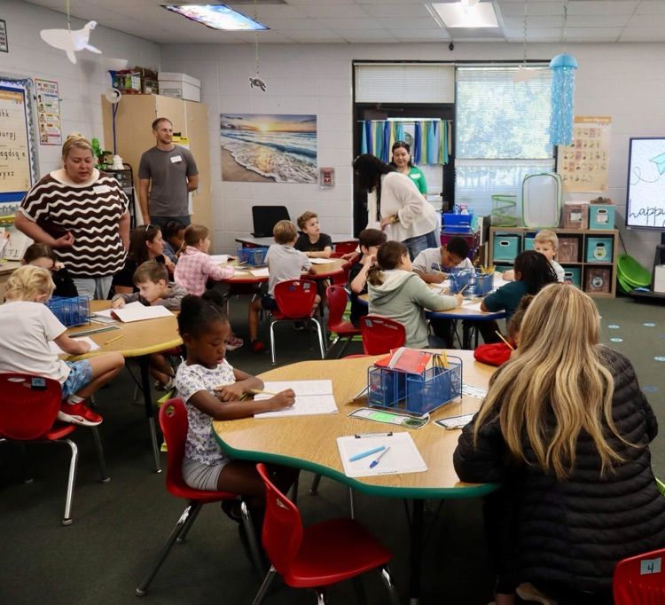 Parents attended Walk-Through Wednesday to watch their child during a Fundations lesson  