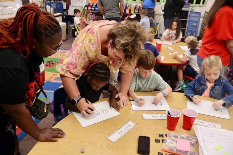 Parents attended Walk-Through Wednesday to watch their child during a Fundations lesson. 