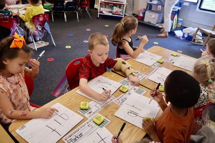 Parents attended Walk-Through Wednesday to watch their child during a Fundations lesson. 