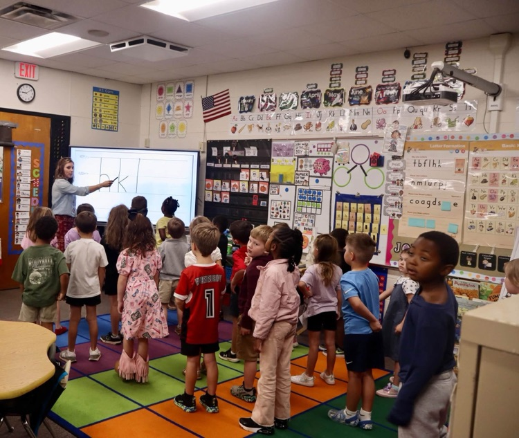 Parents attended Walk-Through Wednesday to watch their child during a Fundations lesson. 