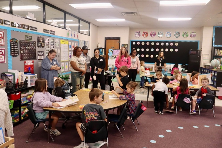 Parents attended Walk-Through Wednesday to watch their child during a Fundations lesson. 