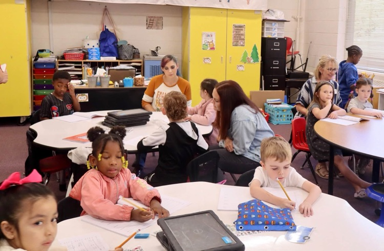 Parents attended Walk-Through Wednesday to watch their child during a Fundations lesson. 