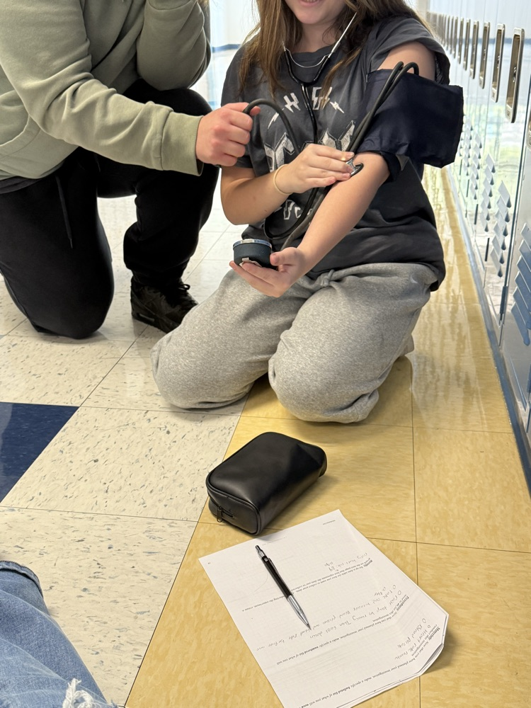 Using the nurse’s stethoscope to measure heart rate