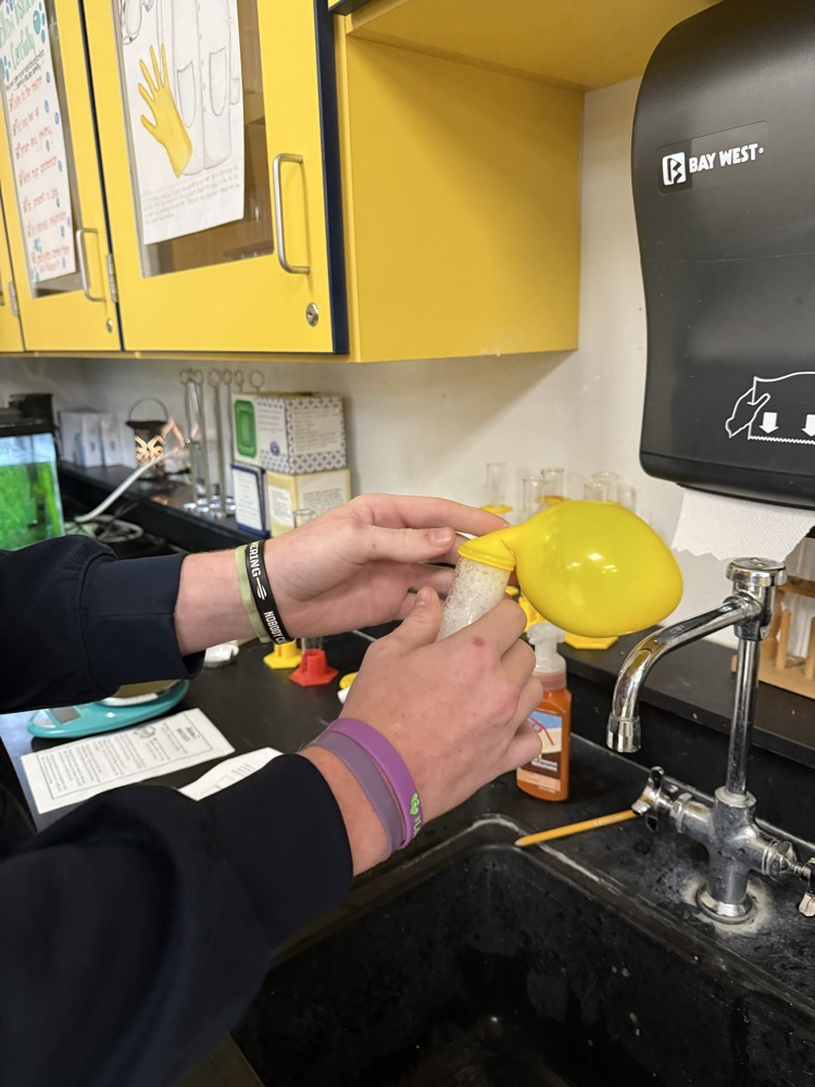 Using baking soda to blow up a balloon