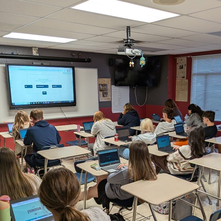 Mr. Lacy’s Economics class using a College Cost simulator!