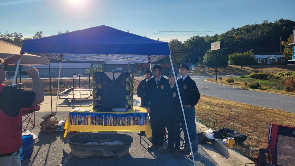 Members at Tractor Supply after set up.