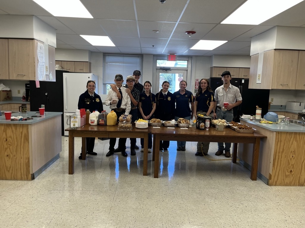 Members participating in teacher breakfast. 