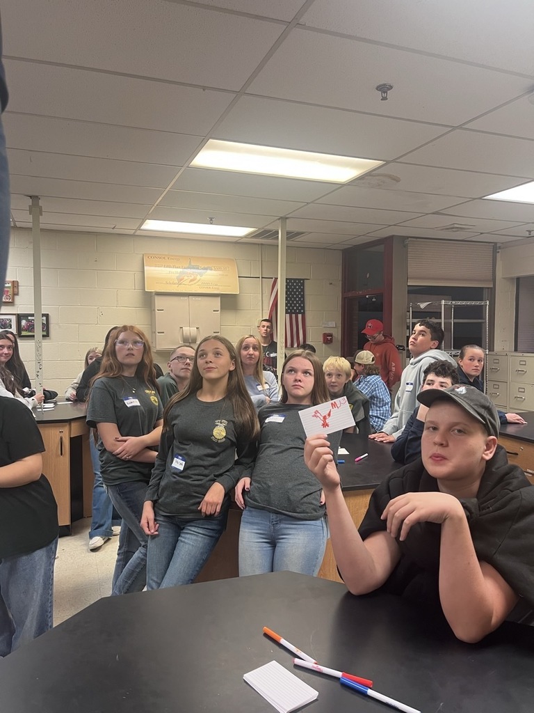 FFA members working with others on group problem solving.