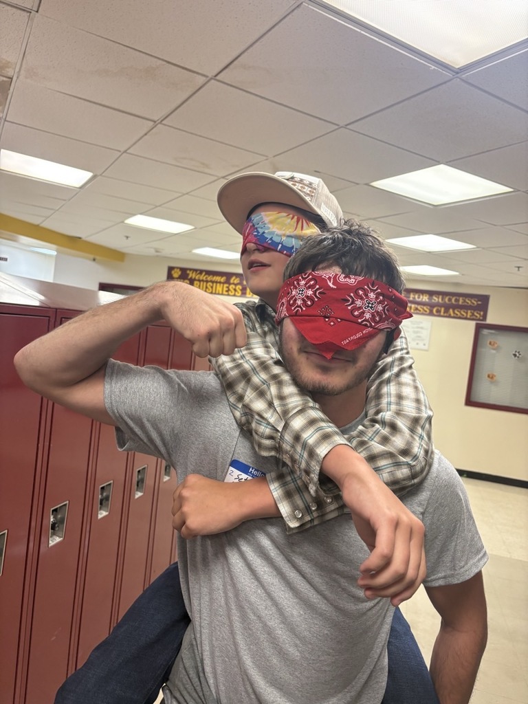 FFA members Wyatt Bartley and Seth Mowrey blind leadership through maze. 