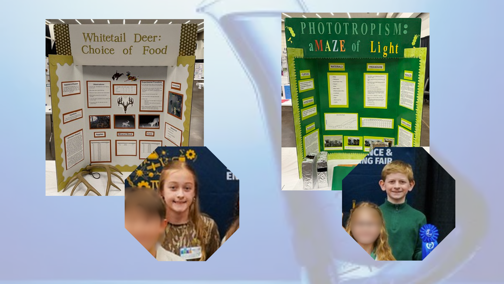 Science fair display boards show student experiments on whitetail deer food preferences and phototropism. Two Warm Springs Intermediate scholars stand proudly with their projects after placing at the state science fair.