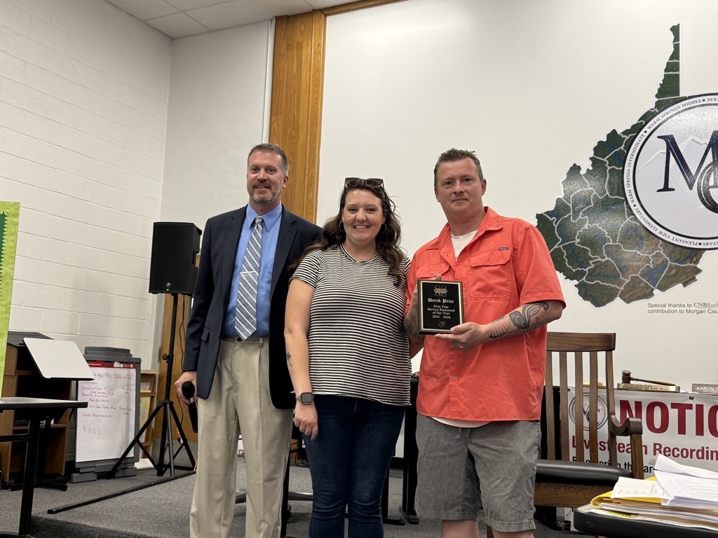 Board Member with 2 staff nominated for First Year Service Personnel.