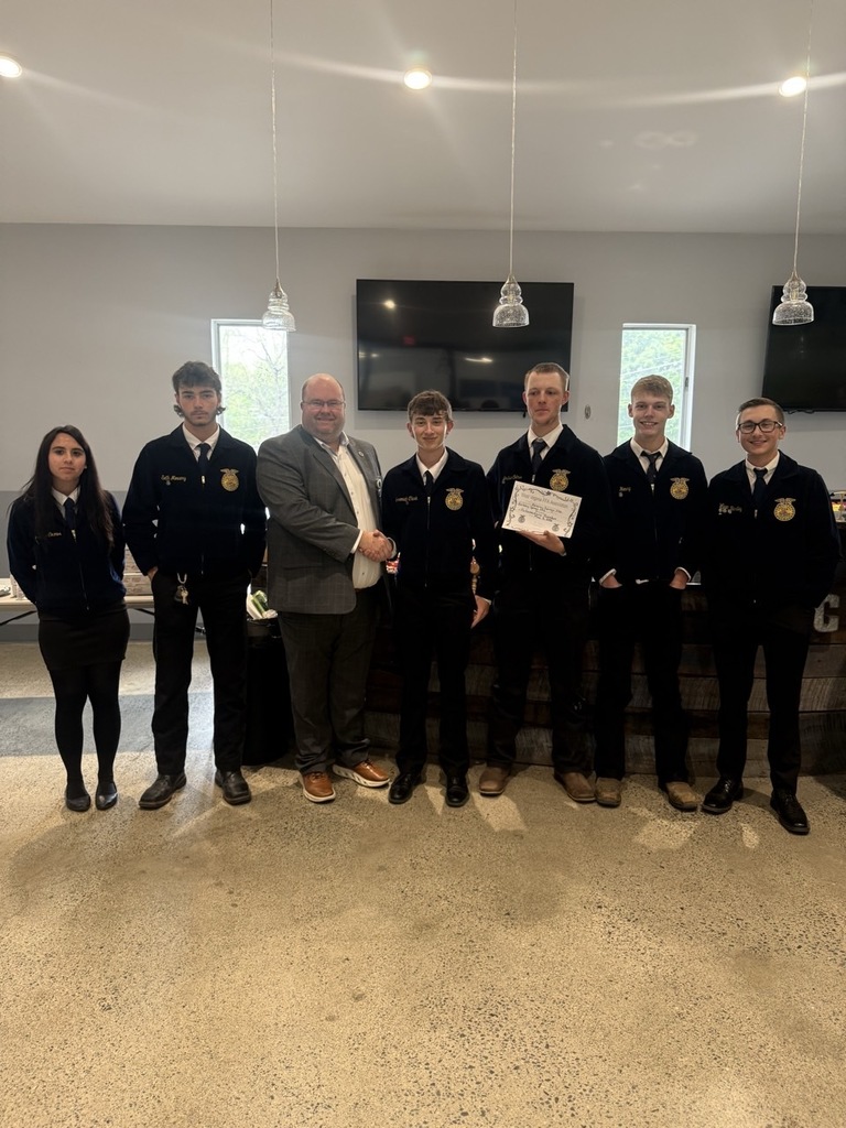 The BSHS Parliamentary Procedure Team Accepting their first place certificate.