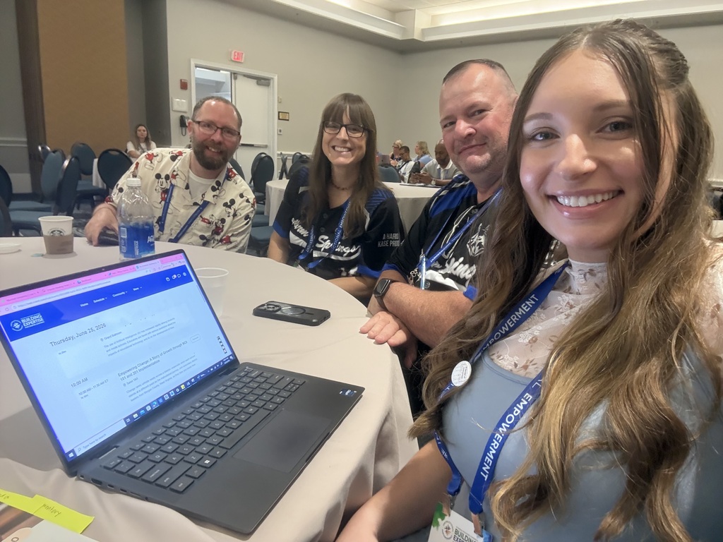 Mitch Nida, Meghan Powell, Jamie Harris and Tiffany Clemins at the Instructional Empowerment Conference. 