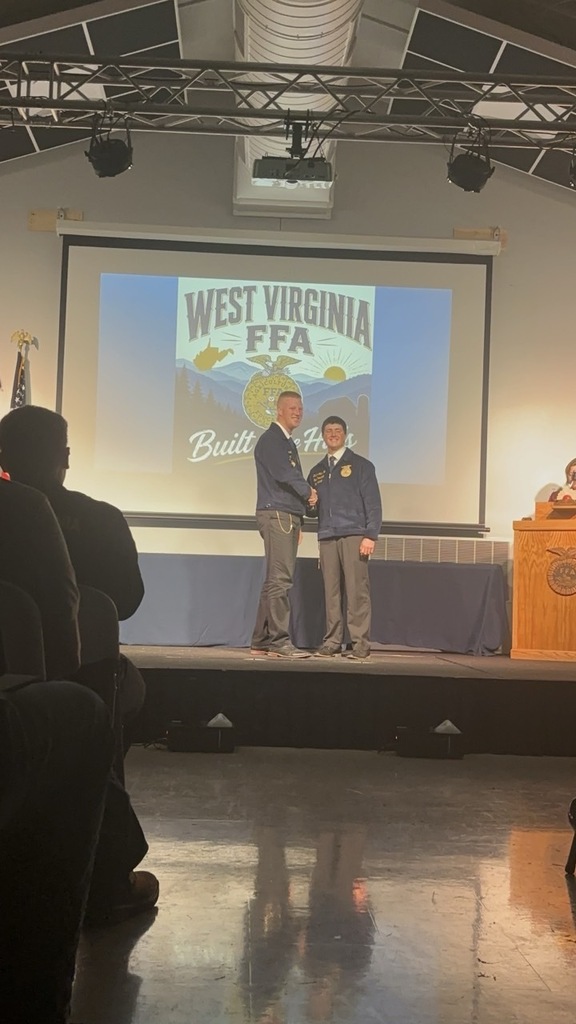 Grant Michael being recognized to receive his American FFA Degree at the National Convention in October
