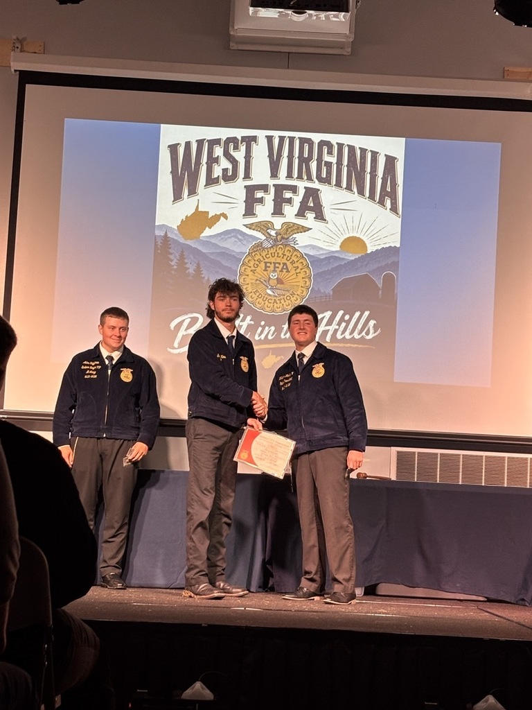 Seth Mowery receiving his State FFA degree