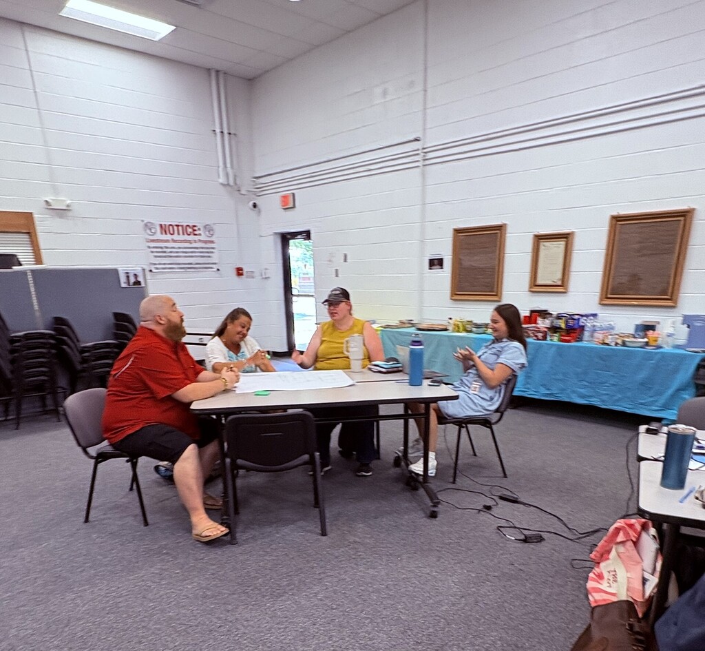 Staff members participating in a training.