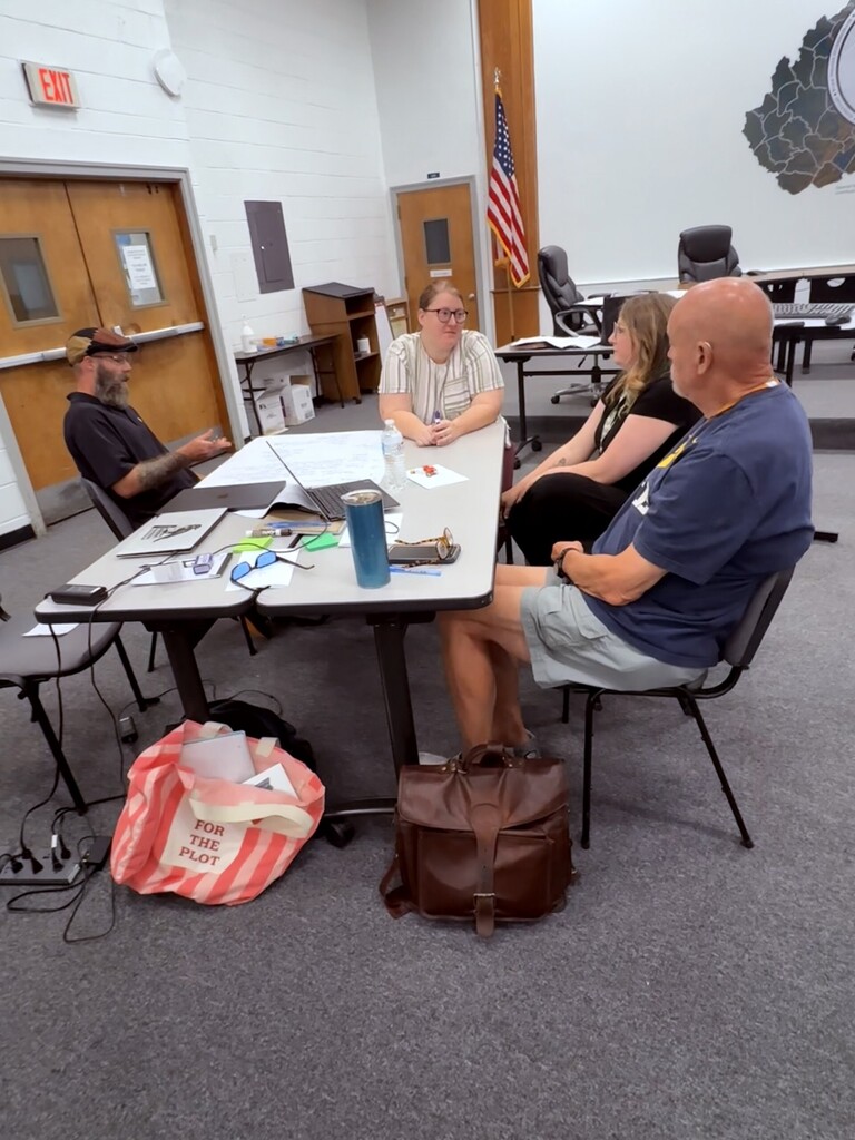 Staff members participating in a training.