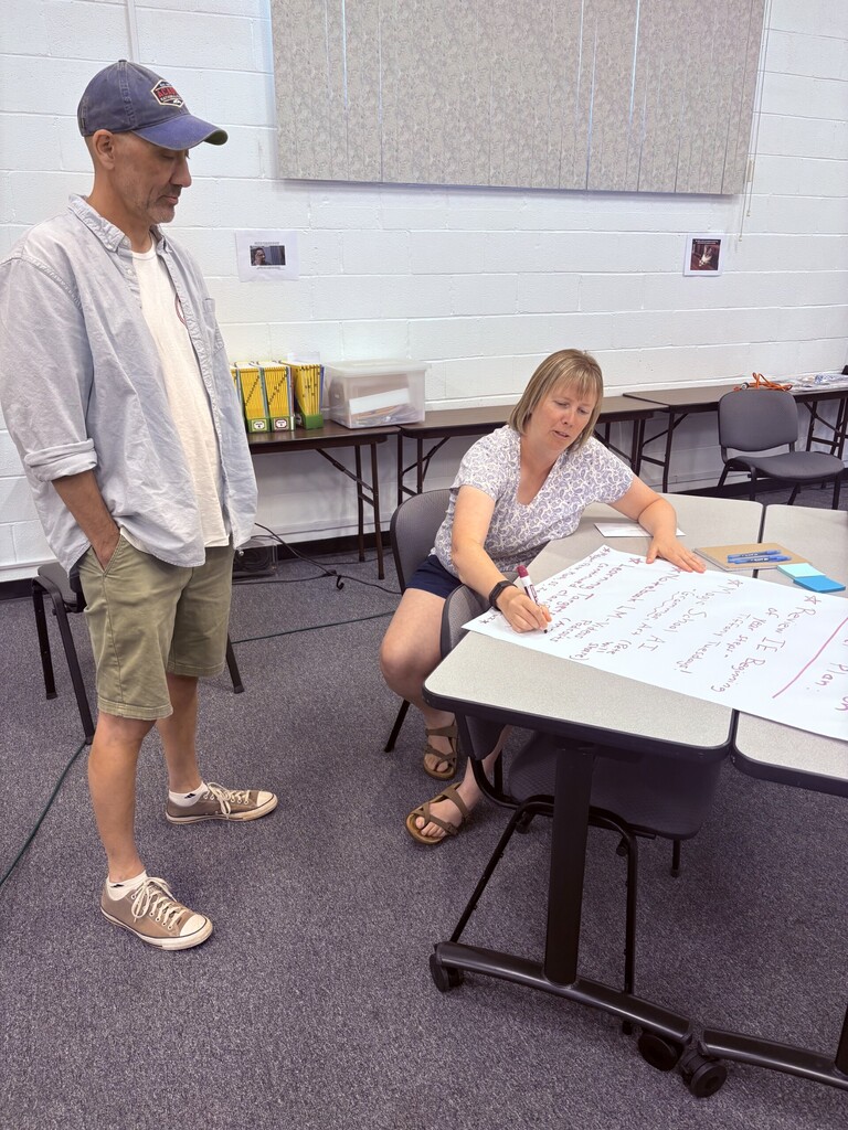 Staff members participating in a training.