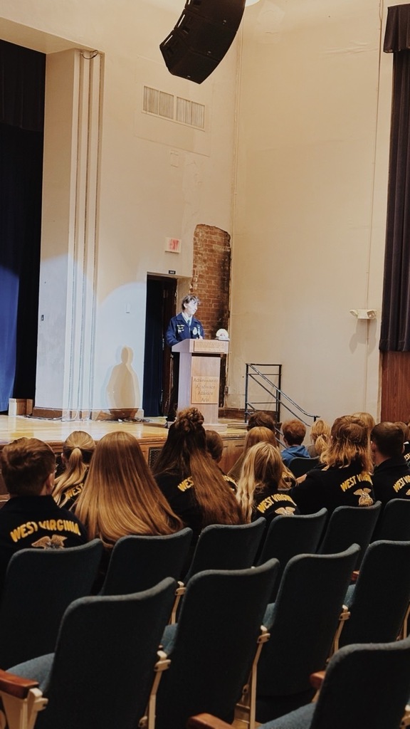 members listening to our president in opening ceremony
