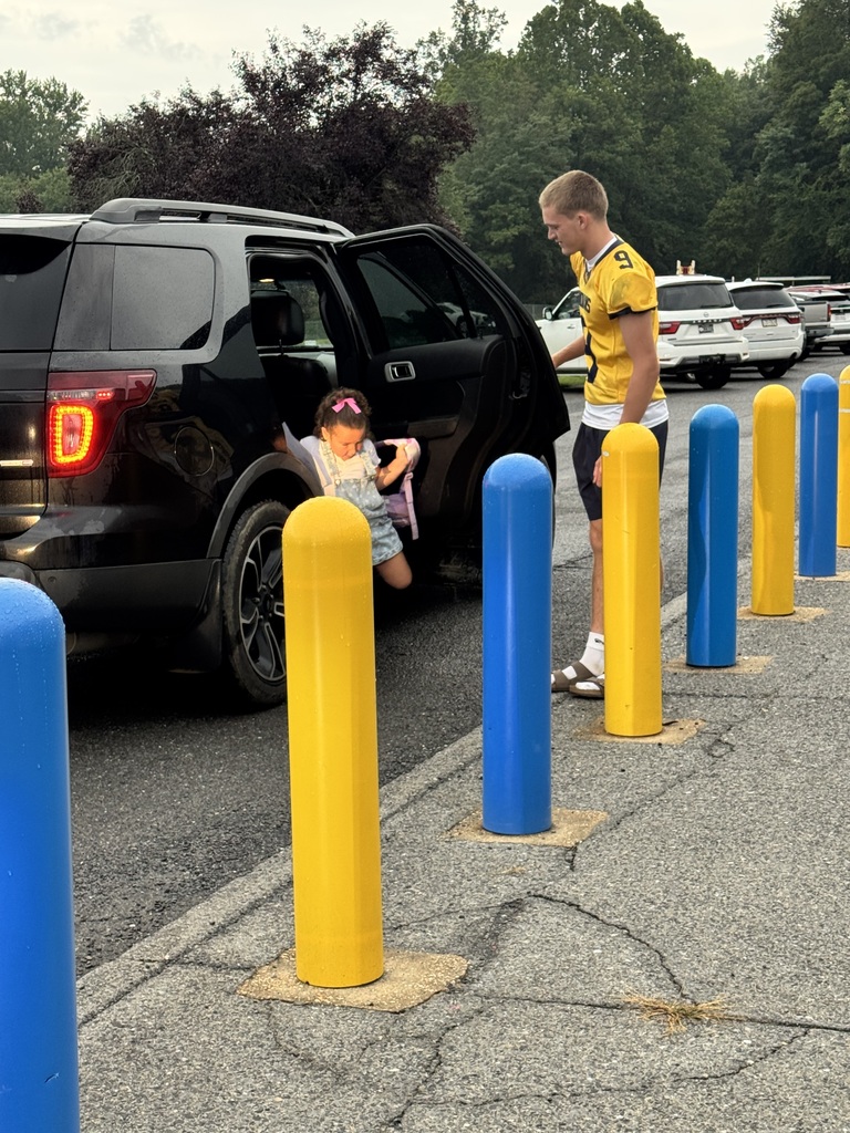 These are pictures of high school students opening car doors and greeting students.