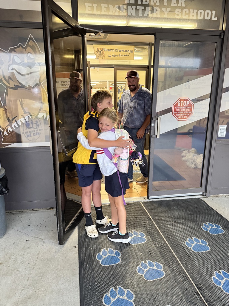 These are pictures of high school students opening car doors and greeting students.