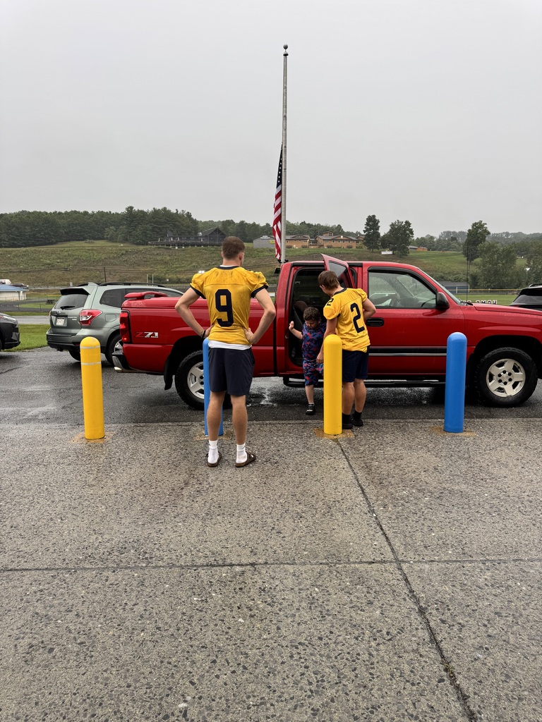 These are pictures of high school students opening car doors and greeting students.