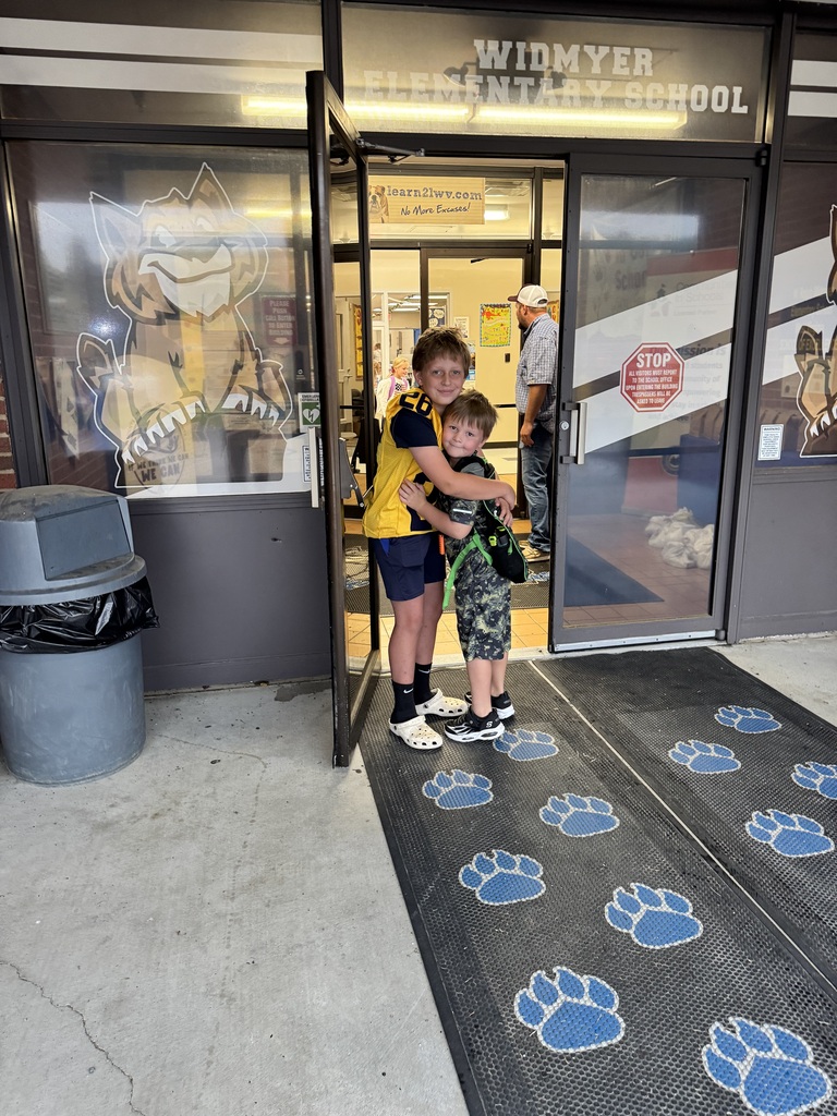 These are pictures of high school students opening car doors and greeting students.