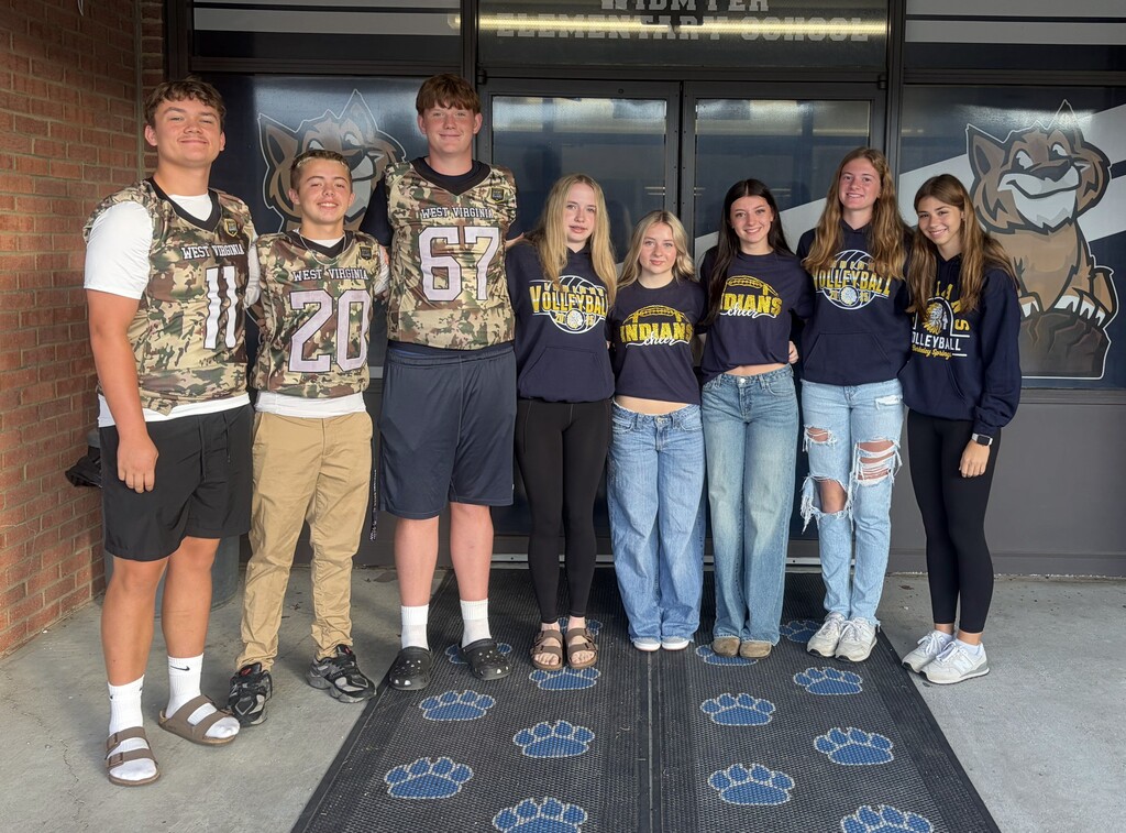 These are pictures of high school students opening car doors and greeting students.