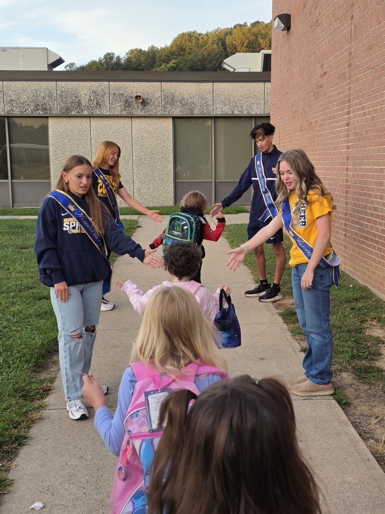 These are pictures of high school students opening car doors and greeting students.